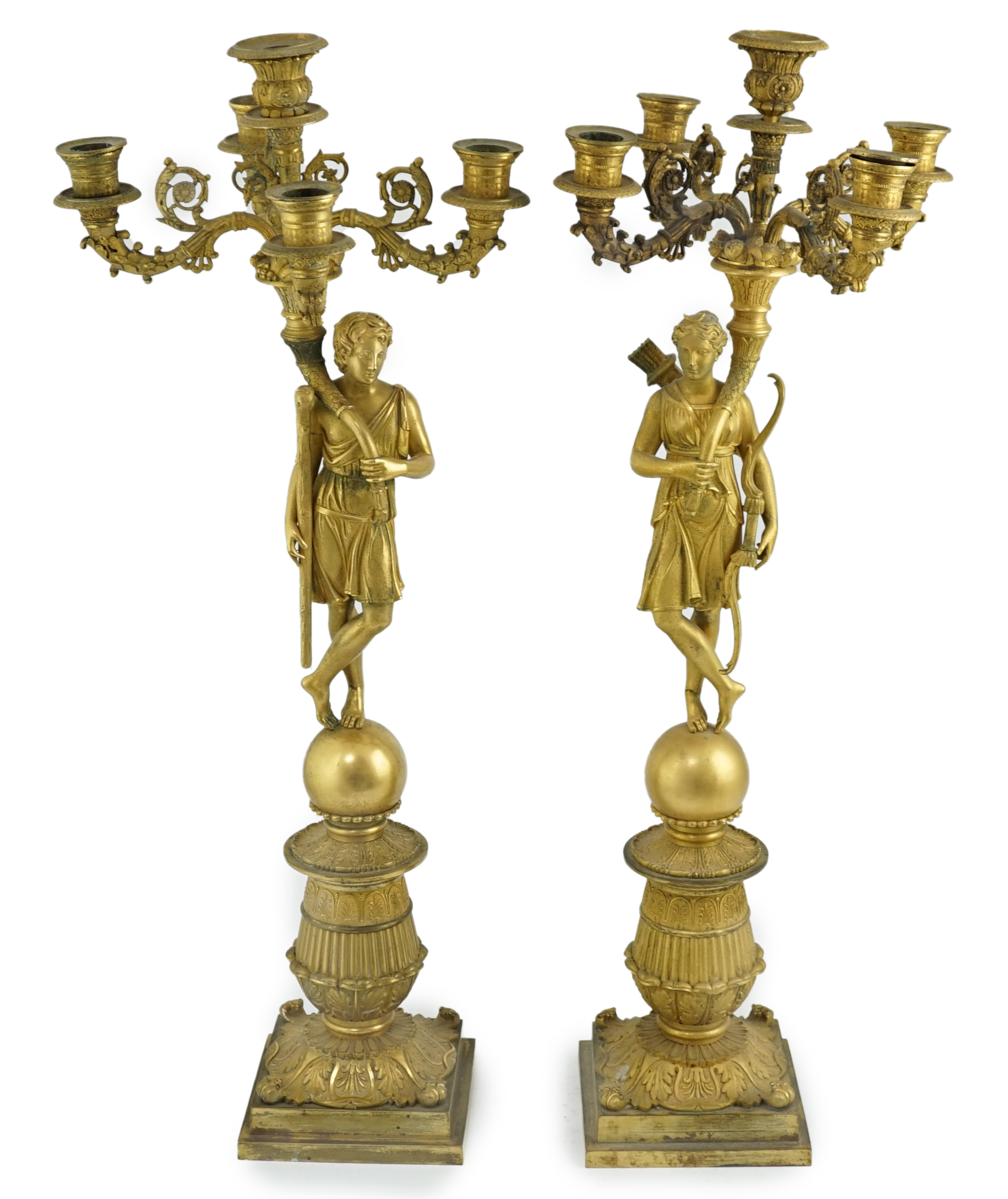 After Pierre-Philippe Thomire (1751-1843), a pair of Regency French Empire five light candelabra 25cm wide, 64cm high